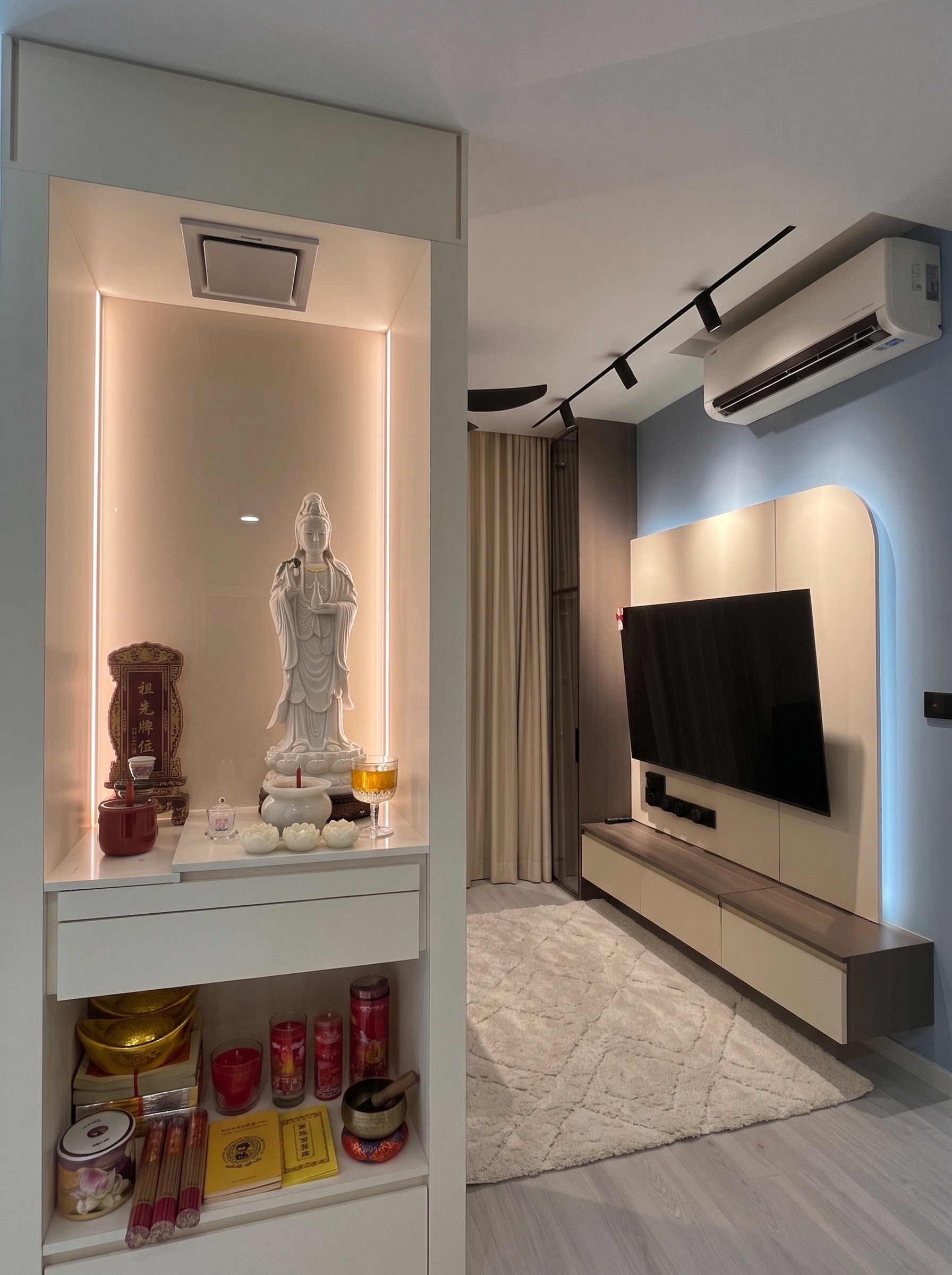 Dual WFH station with L-shaped desk, lit Funko Pop display shelf, and overhead cabinets